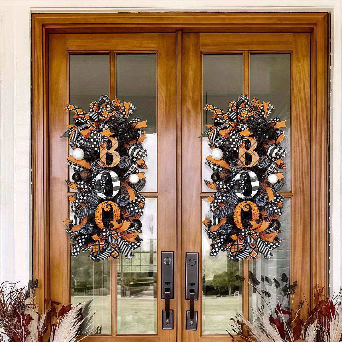 Halloween wreath with black pumpkin and skull sign for front door decoration