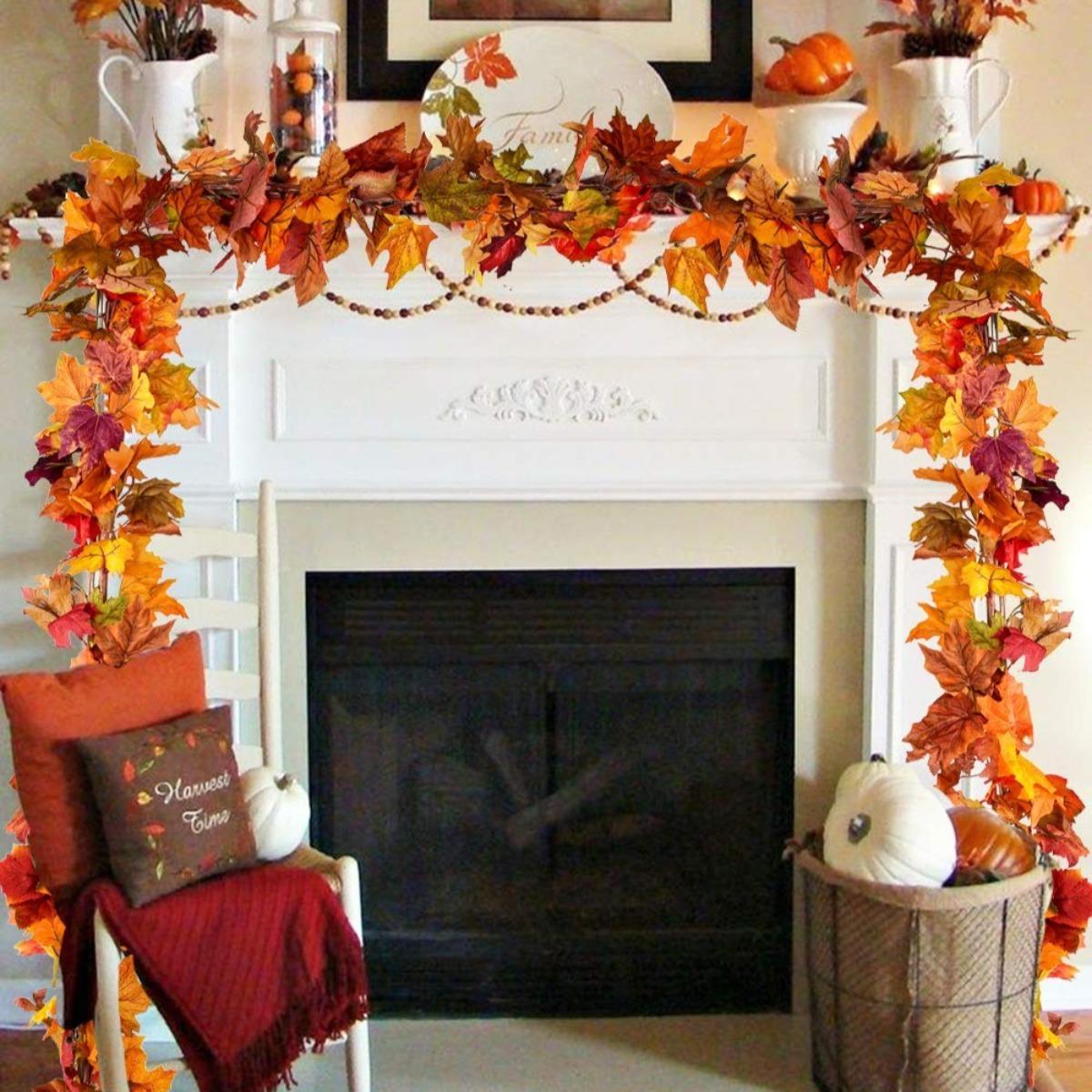 Artificial autumn foliage garland in warm fall tones for home decoration