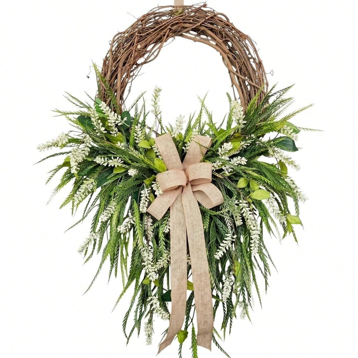 Farmhouse front door wreath with burlap bow green foliage and white flowers for spring summer rustic home porch and wall decor