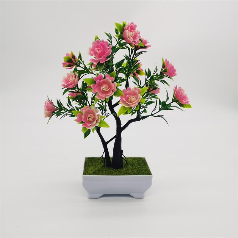 Faux pine bonsai plant on shelf – artificial welcoming pine for desk decoration