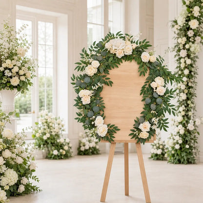 Artificial white rose eucalyptus garland with LED lights wrapped around circle arch frame on wood welcome sign board in bright venue – IPOPU
