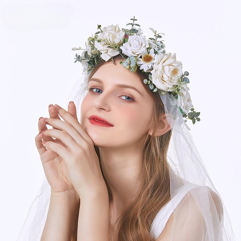 Close-up of boho rose flower crown with delicate blooms for bridal styling