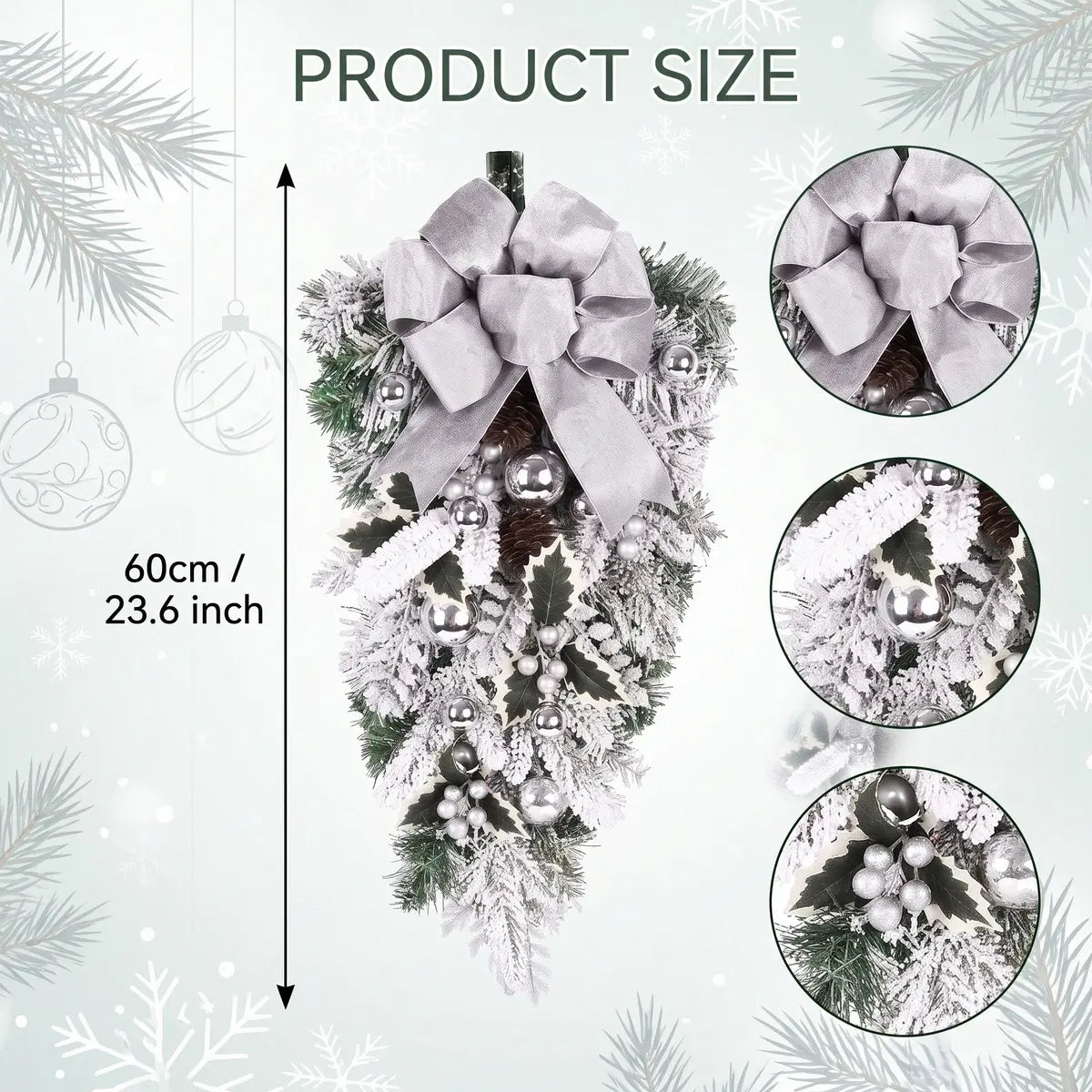 23.6 inch white Christmas teardrop swag with silver bow, silver ball ornaments, frosted pine branches, white berry clusters and holly leaves, product flat lay on white background
