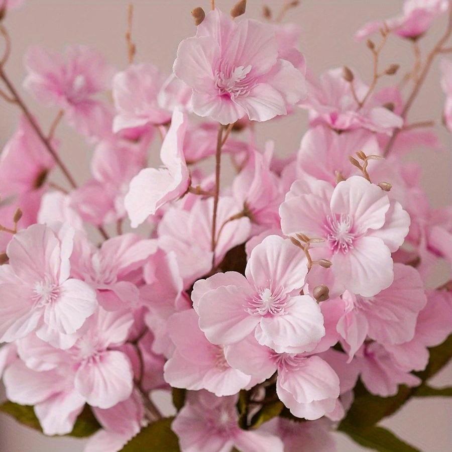 Close-up of silk magnolia blossom on faux flower stem for home decor