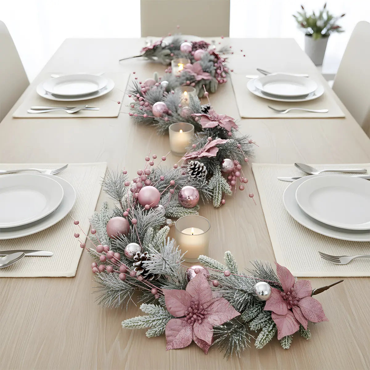 Pink Christmas Garland Styled as Table Runner with Candles and Place Settings
