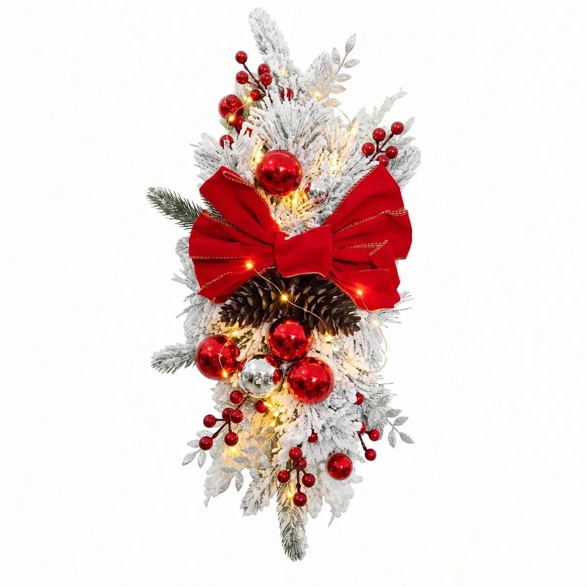Close-up of red bow Christmas teardrop swag with pinecones and ornaments