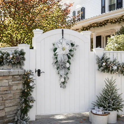 27.6 inch silver white Christmas teardrop swag with white poinsettia and shatterproof ball ornaments, hung on white outdoor gate for front door holiday decor

