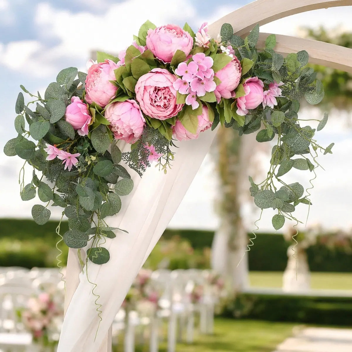 Artificial pink peony eucalyptus arch swag 70cm draped over white metal moon arch at outdoor wedding ceremony aisle – IPOPU
