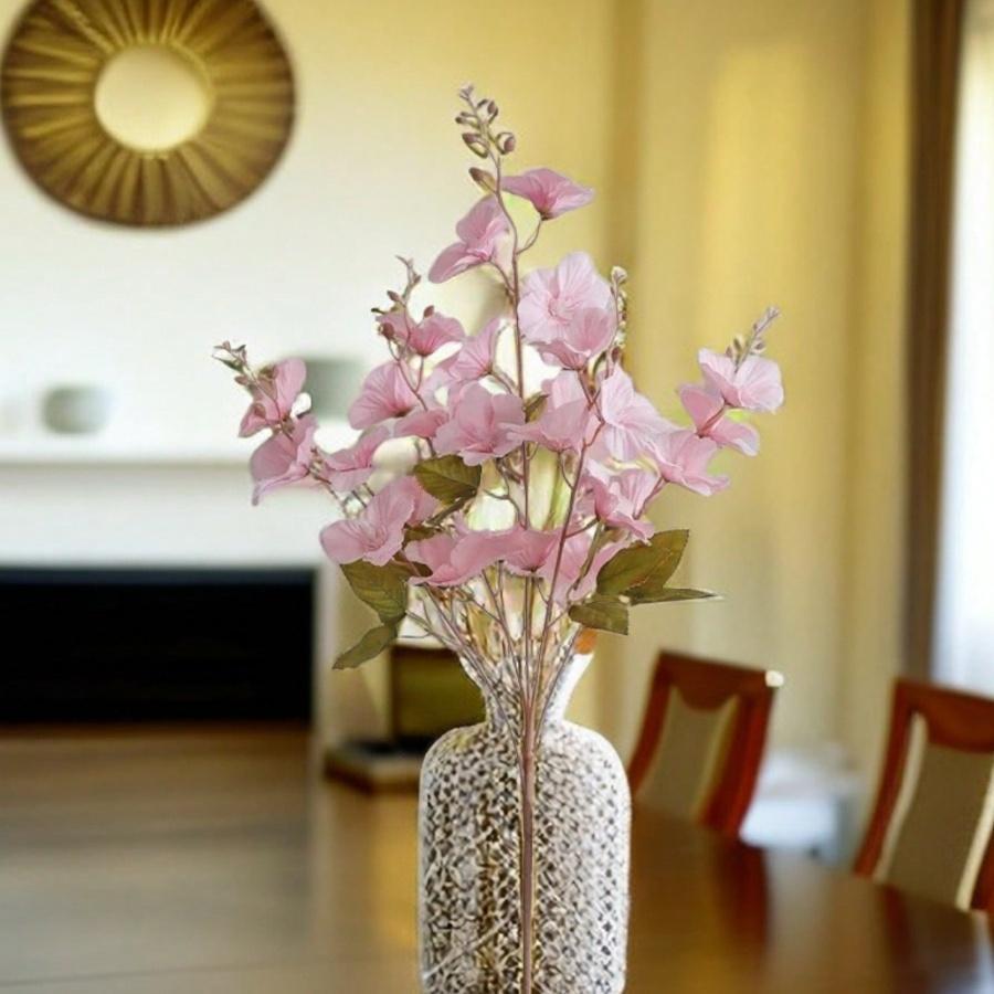 
Set of 3 artificial magnolia stems arranged in vase for living room display