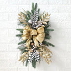 Christmas Door Swag with Bow, Artificial Pine Needle Swag with Berries & Glitter Leaves for Front Door Wall Fireplace Staircase Holiday Decor
