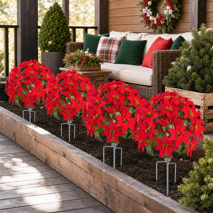Multiple red poinsettia ball ground stakes in outdoor Christmas yard display – IPOPU
