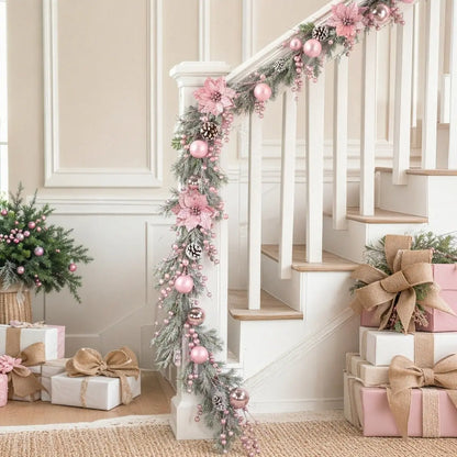 Pink Artificial Christmas Garland with Ornaments Draped on Staircase Banister
