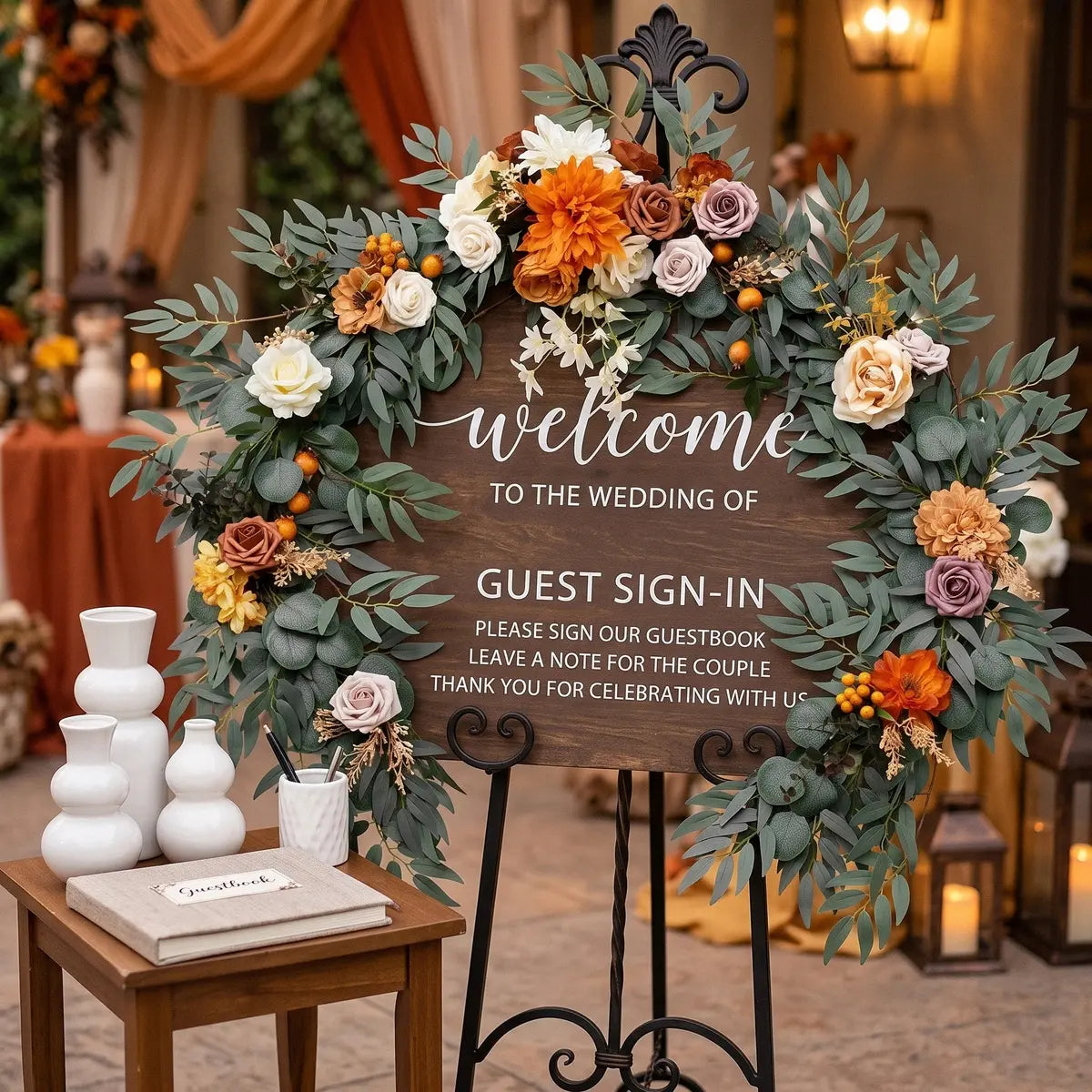 Faux Eucalyptus Rose Vine Garland Decorating a Wedding Welcome Sign Backdrop
