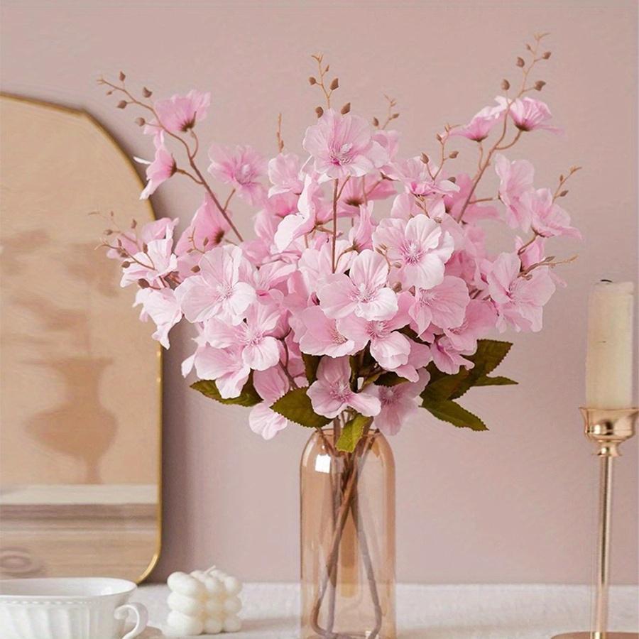 Faux magnolia blossom stems for wedding table centerpiece and floral arrangement