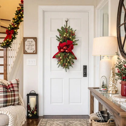 Artificial Christmas swag with red bow and greenery hung on a wall in a cozy living room holiday setting
