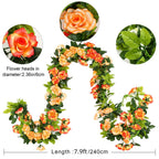 Close-up of lifelike rose flower garland with fruit accents for hanging floral decor by IPOPU