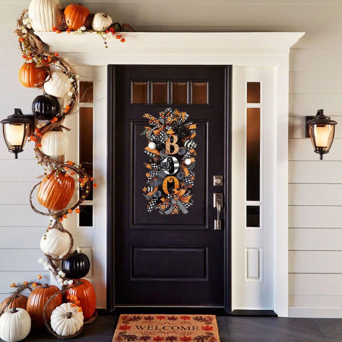 Detail of halloween wreath for front door for black white pumpkin by IPOPU