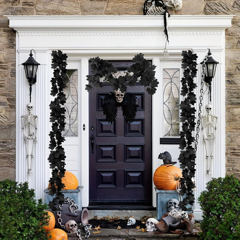 Halloween black maple leaf garland draped over fireplace mantel decoration