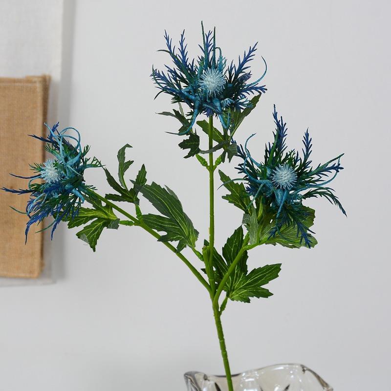 Blue artificial thistle stems in rustic vase – boho wedding and farmhouse decor