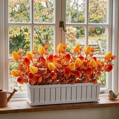 5-piece autumn harvest artificial lantern flowers arrangement displayed on a sunny windowsill in a white planter
