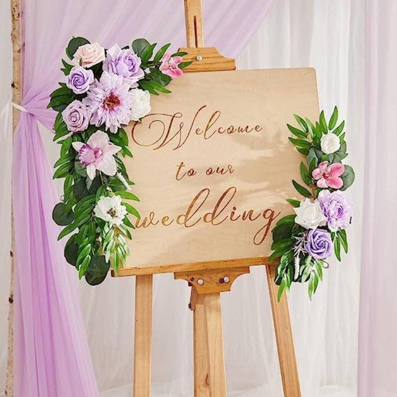 Flowers for wedding welcome sign & arch styled for ceremony backdrop by IPOPU