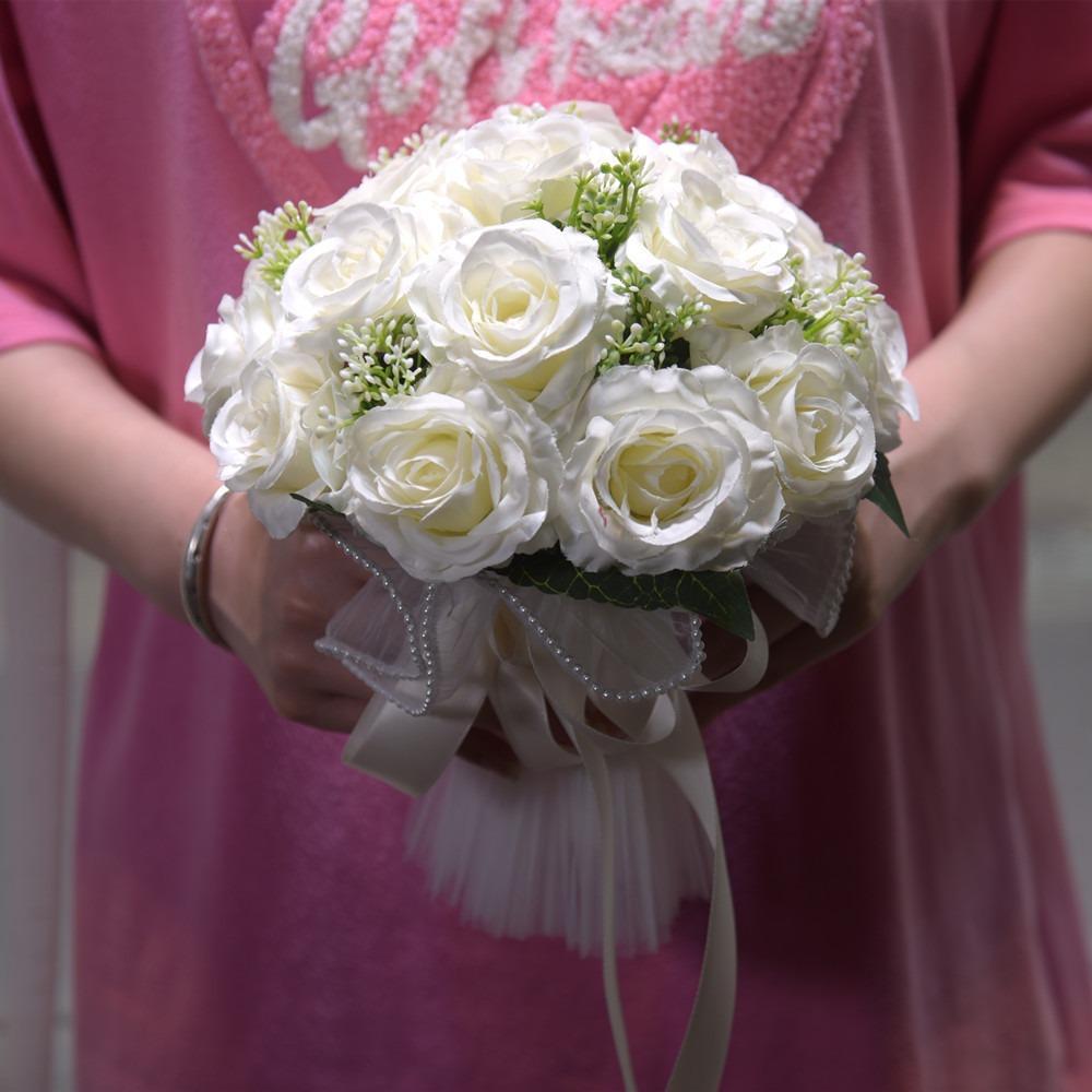 Artificial rose bridal bouquet side view showing full stem and blooms