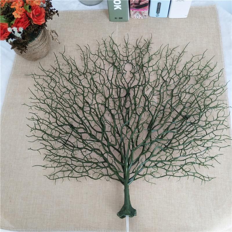 Peacock & coral branch decoration arranged for table centerpiece by IPOPU