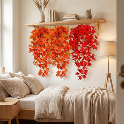 Faux autumn maple leaf vines draped over bedroom wall shelf, indoor fall home decor