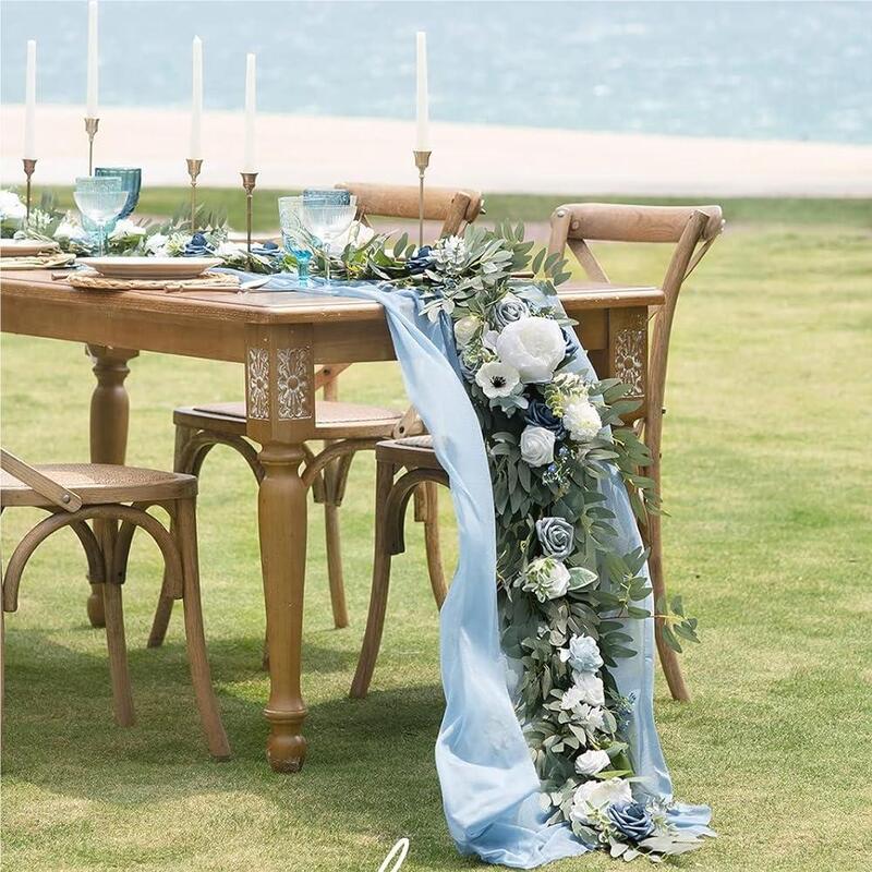 6ft eucalyptus garland with white flowers used as wedding backdrop decoration