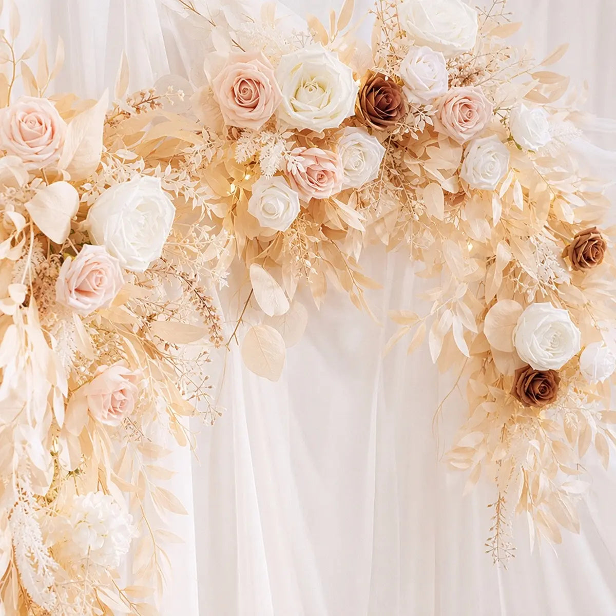 Boho artificial blush white brown rose garland with champagne foliage draped over white fabric wedding arch backdrop closeup – IPOPU
