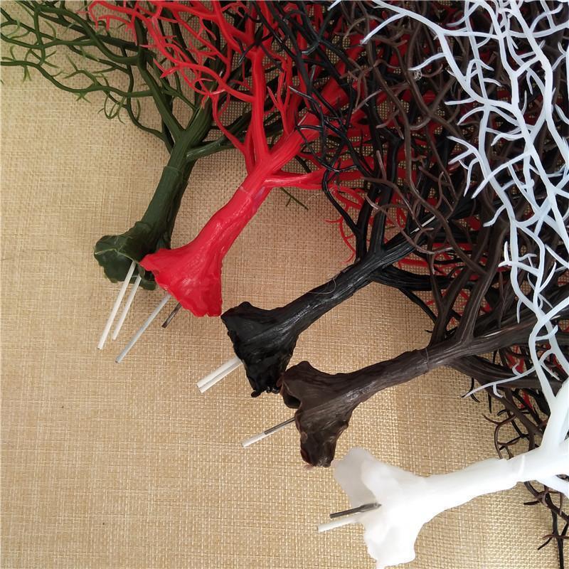 Peacock & coral branch decoration arranged for table centerpiece by IPOPU