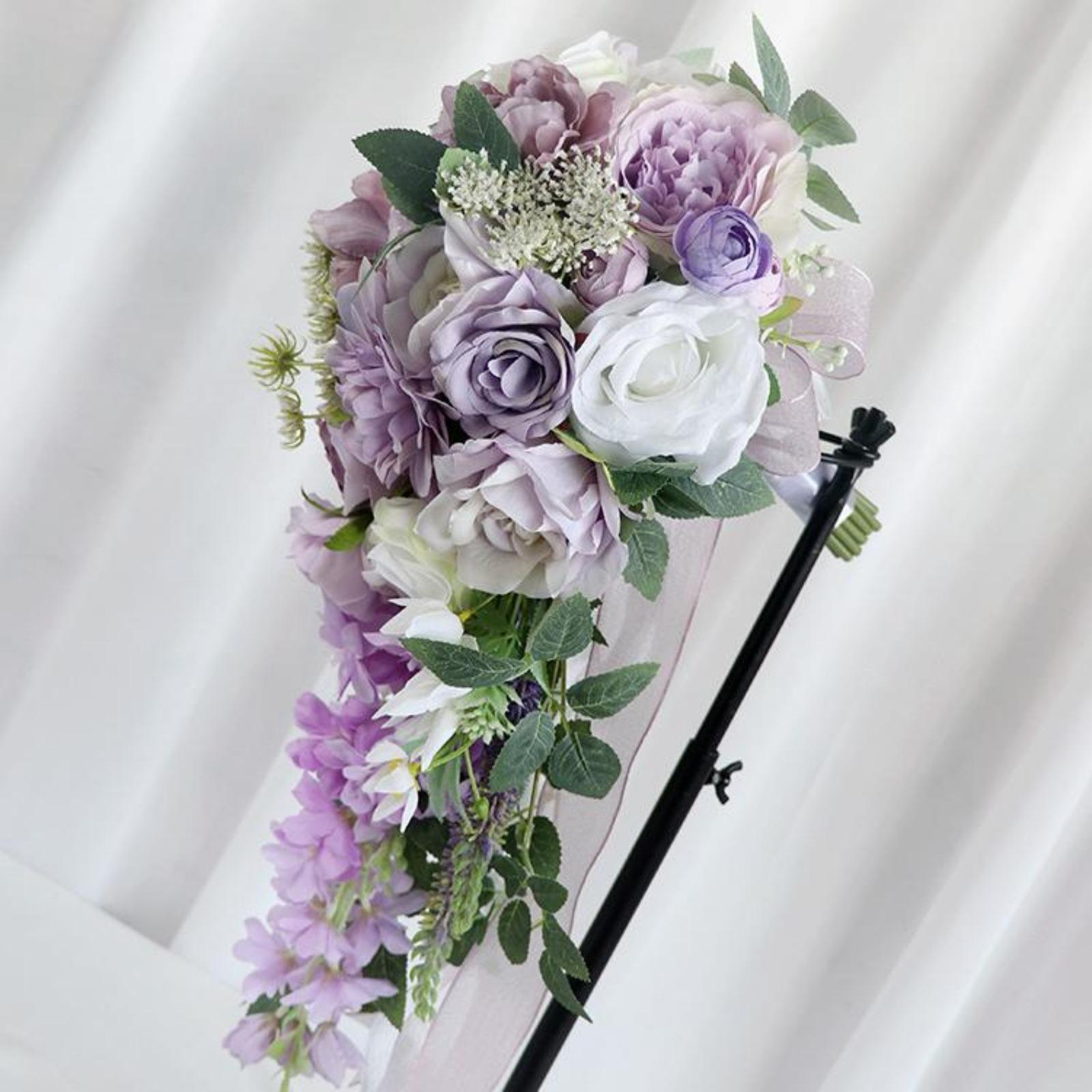 Cascading rose bridal bouquet purple & ivory arranged for wedding ceremony by IPOPU
