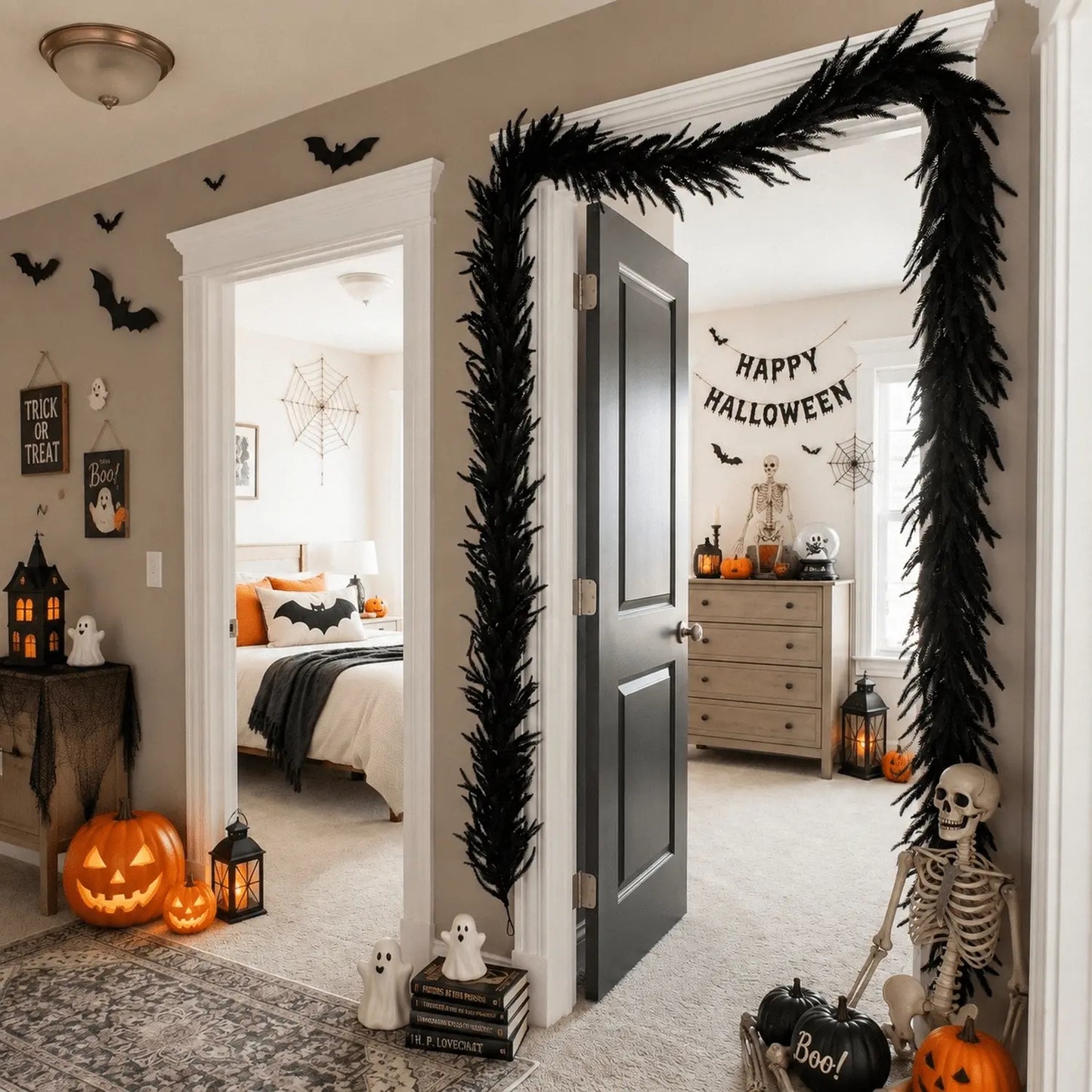 Black faux pine garland framing an indoor doorway arch with Halloween skeleton, ghost figurines, jack-o-lanterns and Happy Halloween banner in background
