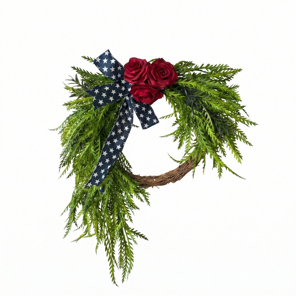Patriotic cascading wreath with red roses navy blue star ribbon and green foliage for front door porch and wall decor for 4th of July Memorial Day and Labor Day