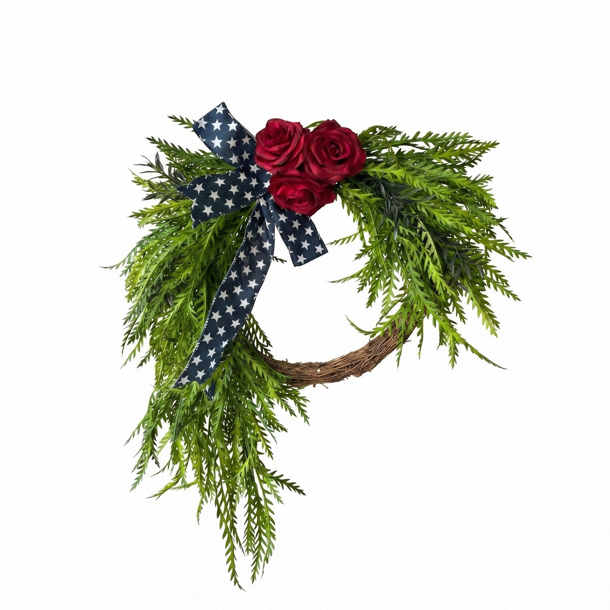 Patriotic cascading wreath with red roses navy blue star ribbon and green foliage for front door porch and wall decor for 4th of July Memorial Day and Labor Day