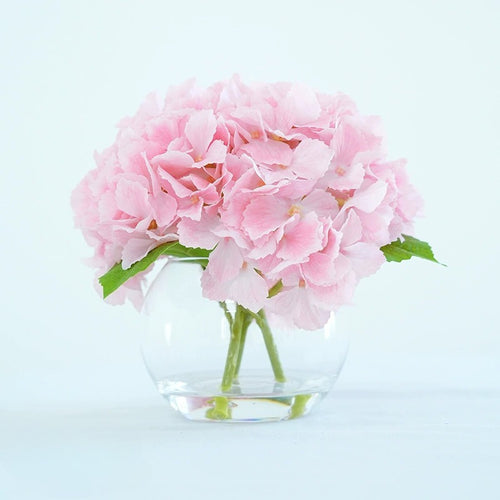 Pink artificial hydrangea flowers in glass vase for home dining table office decor centerpiece