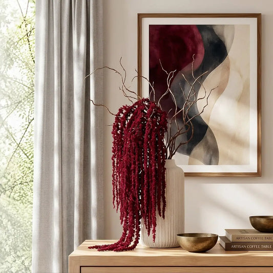 Burgundy artificial hanging amaranthus stem displayed indoors against wall — IPOPU
