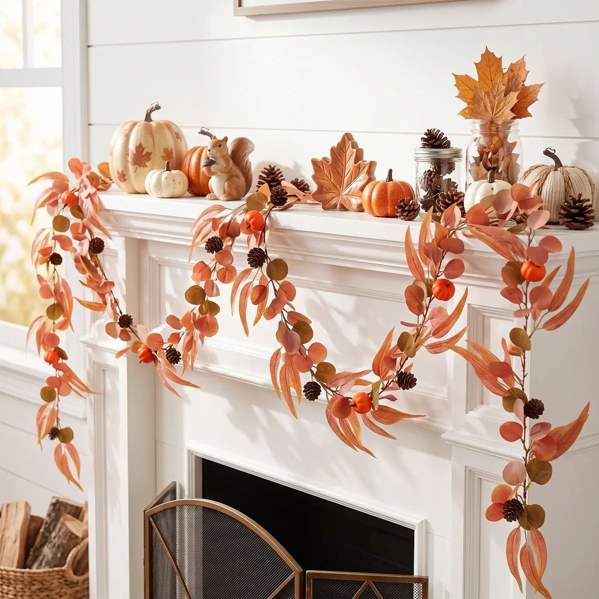 2-piece pumpkin fall maple leaves garland draped over a white fireplace mantel with autumn decor
