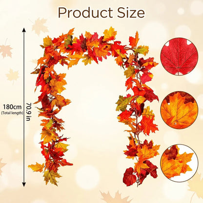 Artificial fall maple leaf vine garland draped across a wooden table as a Thanksgiving centerpiece with pumpkins and candles