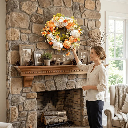 Artificial orange and white peony wreath displayed on a wooden wall for farmhouse autumn Thanksgiving decor