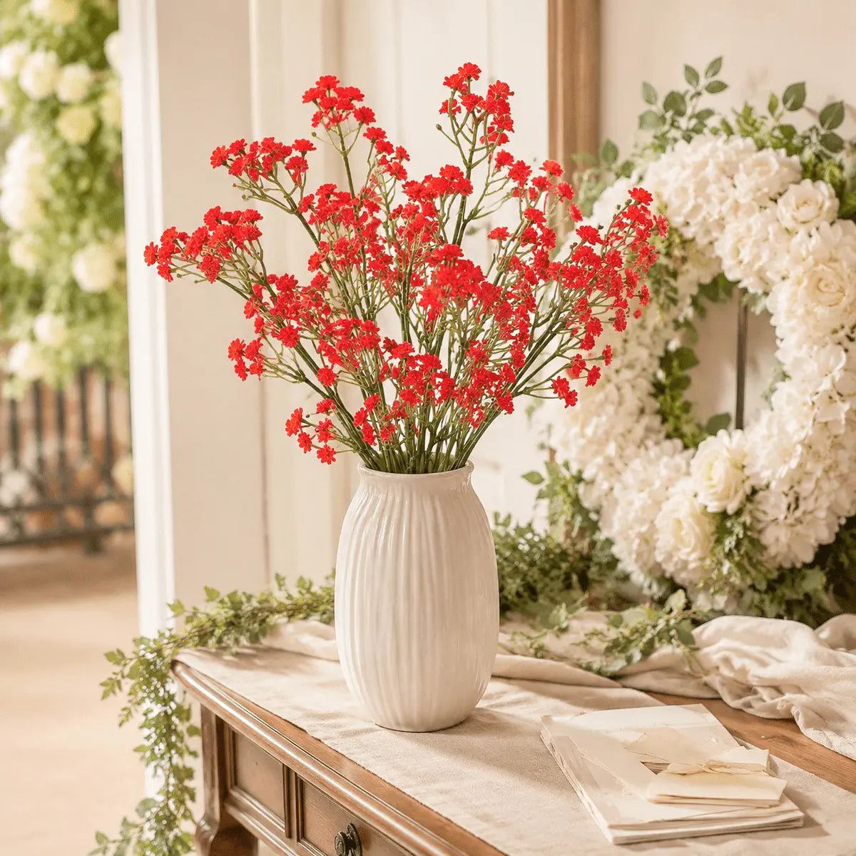 Artificial red baby's breath stems in white ribbed vase on wedding sign-in table with floral arch – IPOPU
