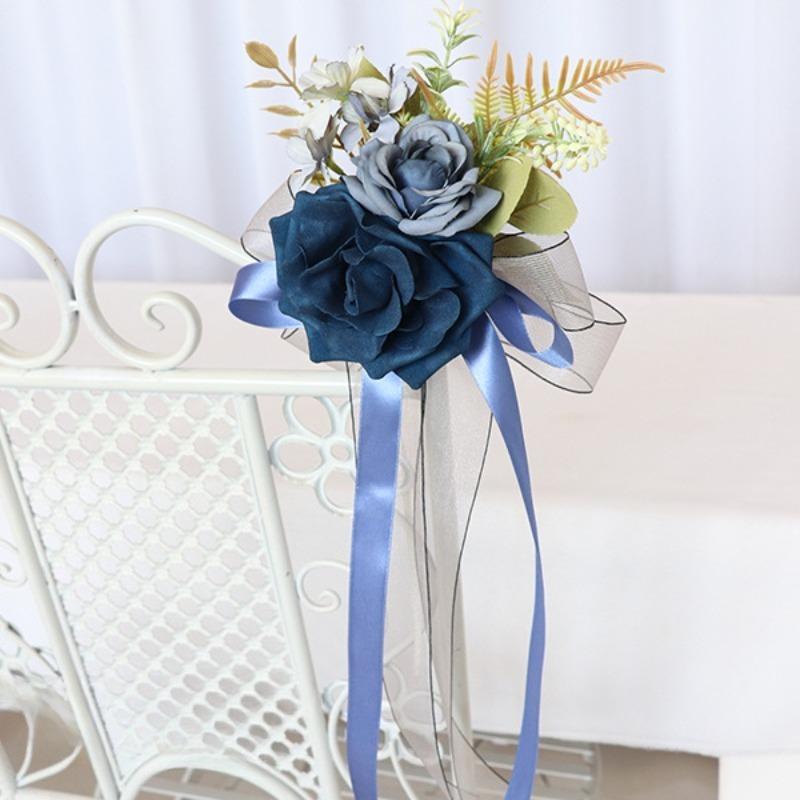 Blue artificial flower pew decoration with eucalyptus and ribbon wedding aisle decor