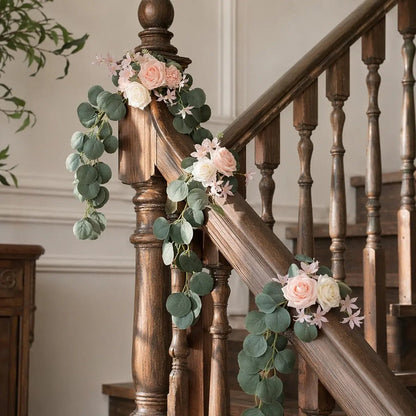 Blush pink rose silver dollar eucalyptus swag set of 2 styled along dark wood staircase banister at three anchor points draping naturally indoors – IPOPU