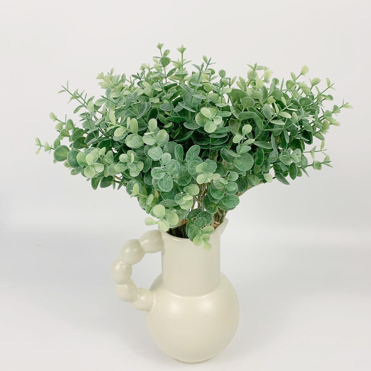 Green artificial eucalyptus stems 4pcs in glass vase with faux water for home centerpiece decor