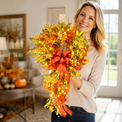 Woman holding large artificial fall teardrop swag wreath with orange maple leaves – IPOPU
