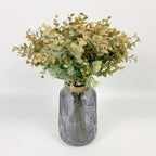 Orange artificial eucalyptus stems 4pcs in glass vase with faux water for home centerpiece decor