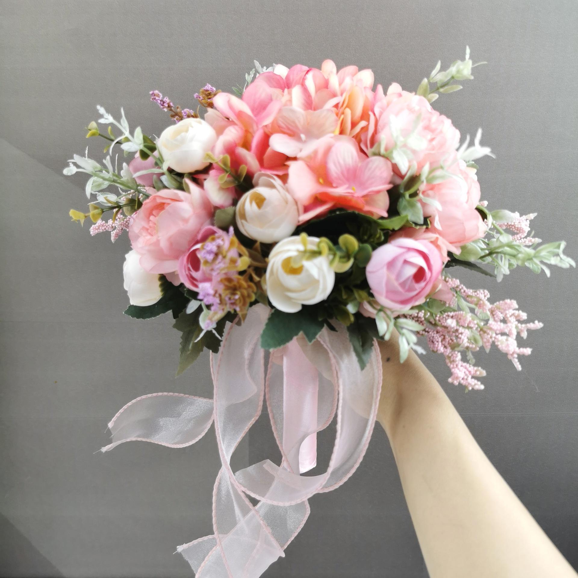 Pink artificial wedding bouquet with roses hydrangeas camellias for bridesmaid
