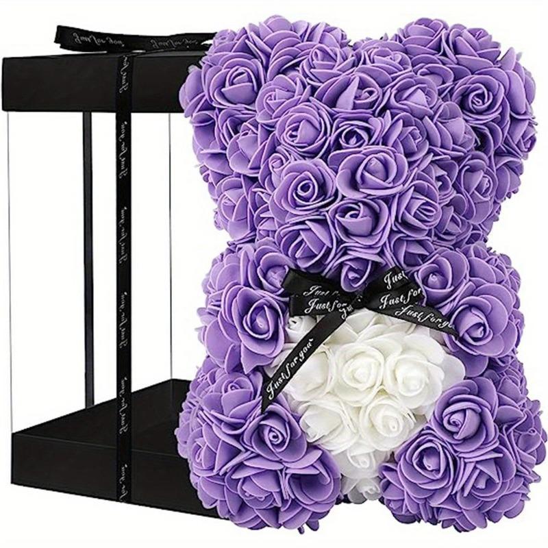 Purple rose teddy bear with black ribbon in colorblock gift box