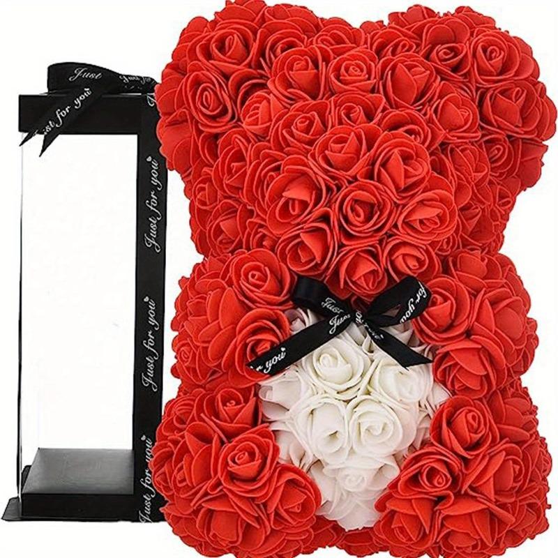 Red rose teddy bear with black ribbon in colorblock gift box

