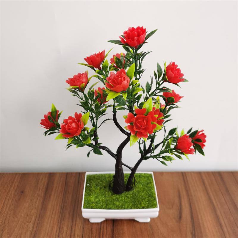 Red artificial pine bonsai with decorative pot for home office decor
